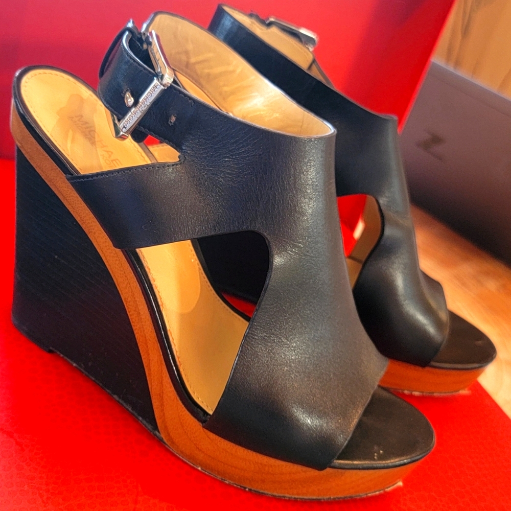 Michael Kors wedge sandals black leather and wood detail.